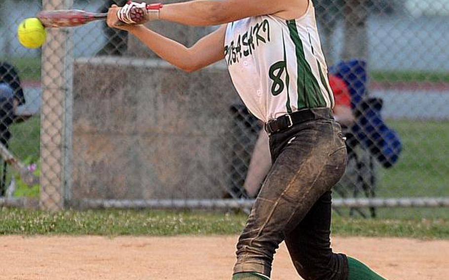 Kubasaki freshman Ari Gieseck makes contact against Kadena during Friday's Game 2 of the Okinawa district softball finals, won by the Dragons 8-4 to complete a two-game sweep. Gieseck, who never played softball before this season, batted 4-for-7 with four RBIs in the two-game series.