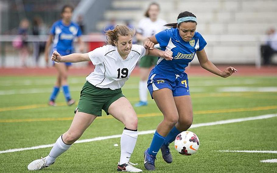 Alconbury's Laela Evans, left, and Sigonella's Miriam Stewart battle for the ball during the DODEA-Europe Division III championship in Kaiserslautern, Germany, on Saturday, May 20, 2017. Alconbury won 1-0 in overtime.

MICHAEL B. KELLER/STARS AND STRIPES