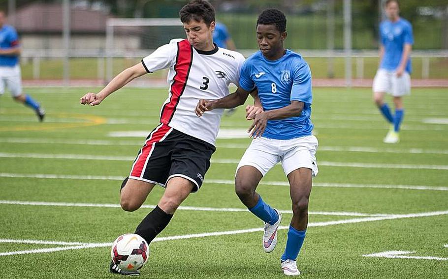 Marymount's Elton Mizine, right, and American Overseas School of Rome's Giuseppe Amara race for the ball during the DODEA-Europe Division II championship in Kaiserslautern, Germany, on Saturday, May 20, 2017. Marymount won the title match 3-2 in overtime.

MICHAEL B. KELLER/STARS AND STRIPES
