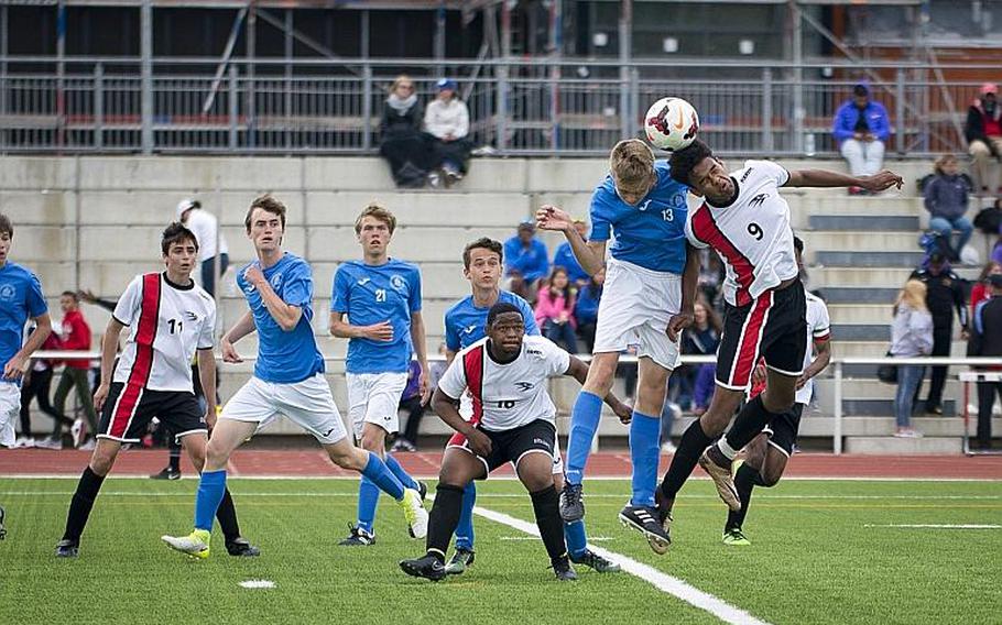 American Overseas School of Rome's Gabriel Smith, right, and Marymount's Asger Lorenzen jump for a header during the DODEA-Europe Division II championship in Kaiserslautern, Germany, on Saturday, May 20, 2017. AOSR lost the match 3-2 in overtime.

MICHAEL B. KELLER/STARS AND STRIPES