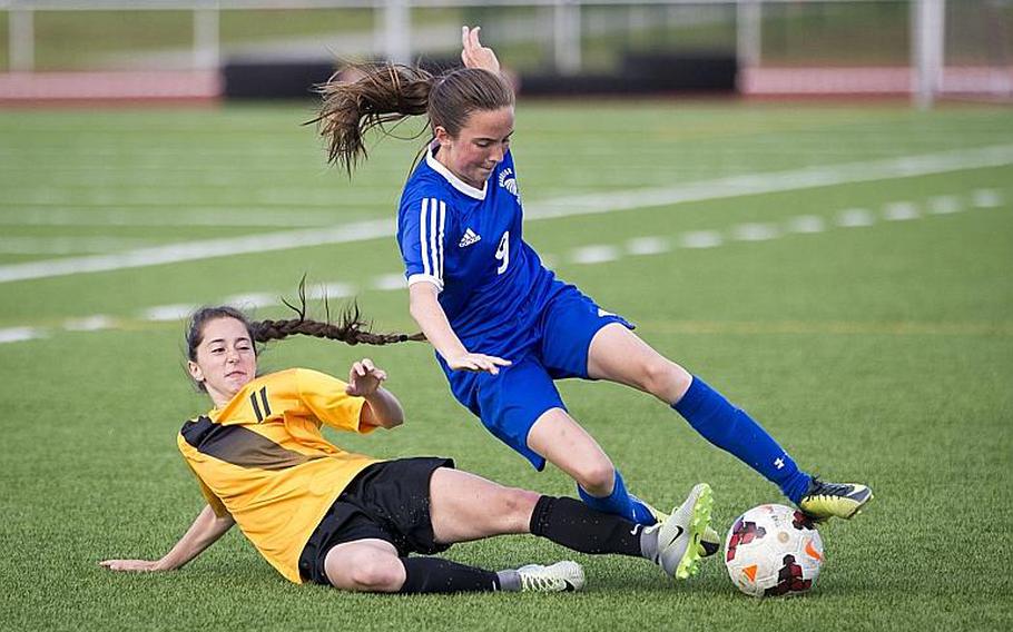 Stuttgart's Janey Greenberg, left, tackles Wiesbaden's Erin Goodman during the DODEA-Europe Division I championship in Kaiserslautern, Germany, on Saturday, May 20, 2017. Stuttgart lost the match in a  3-0 shootout.

