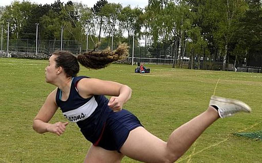 Bitburg's Elise Rasmussen throws a discus just more than 100 feet during the opening track and field meet of the season at RAF Lakenheath, England, Saturday, April 15, 2017. She out threw the boys with her qualifying discus toss.
WILLIAM HOWARD/STARS AND STRIPES
