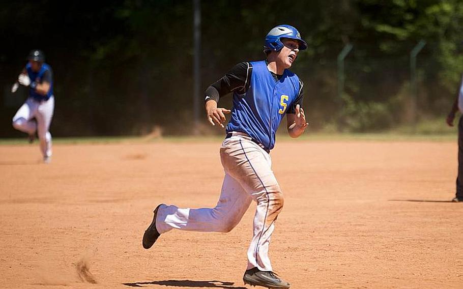 Sigonella's Alex Ogletree runs past third to home during the DODEA-Europe baseball tournament in Kaiserslautern, Germany, on Friday, May 26, 2017. Sigonella won the game 14-3 and advances to the semifinals.

MICHAEL B. KELLER/STARS AND STRIPES