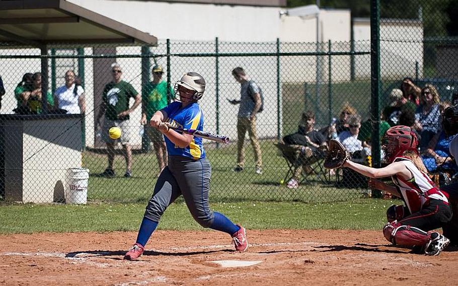 Wiesbaden's Rhianna McInnins hits the ball during the DODEA-Europe softball tournament at Ramstein Air Base, Germany, on Friday, May 26, 2017. Wiesbaden lost the game against Kaiserslautern 10-5.

MICHAEL B. KELLER/STARS AND STRIPES