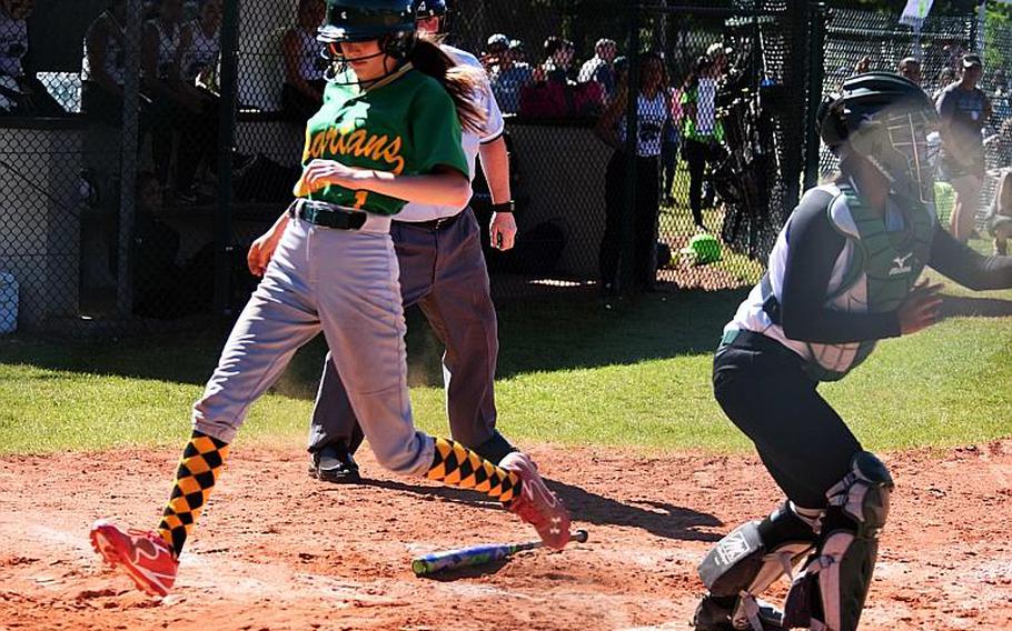 SHAPE's Josie Whitaker runs across home plate during a game against Naples during the second day of the softball championships at Kaiserslautern, Friday, May 26.