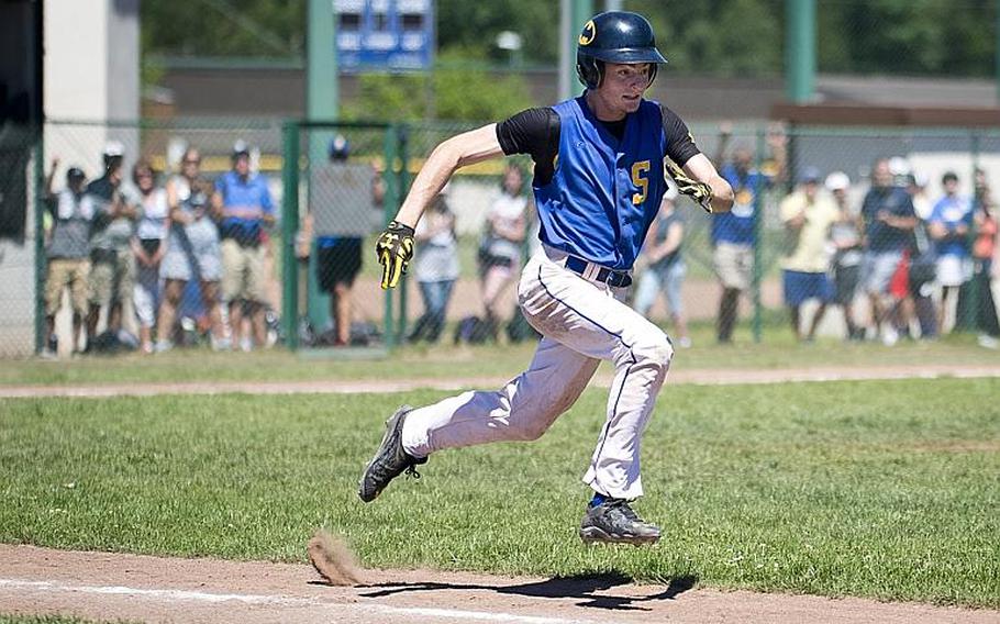 Sigonella's Alex Noack runs to first during the DODEA-Europe Division II/III baseball championship at Ramstein Air Base, Germany, on Saturday, May 27, 2017. Sigonella defeated Bitburg 10-1 to win the title.
MICHAEL B. KELLER/STARS AND STRIPES
