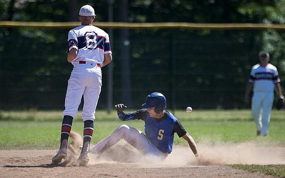 Sigonella's Ethan Lopez, right, slides to second in front of Bitburg's Max Little during the DODEA-Europe Division II/III baseball championship at Ramstein Air Base, Germany, on Saturday, May 27, 2017. Sigonella won the title game 10-1.

MICHAEL B. KELLER/STARS AND STRIPES