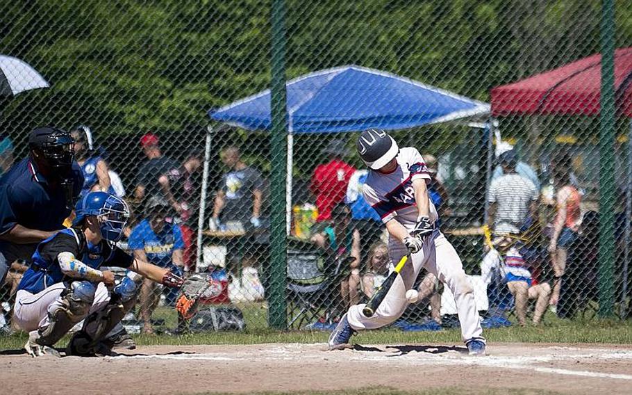Bitburg's Wesley Wade hits the ball during the DODEA-Europe Division II/III baseball championship at Ramstein Air Base, Germany, on Saturday, May 27, 2017. Bitburg lost the game against Sigonella 10-1.

MICHAEL B. KELLER/STARS AND STRIPES