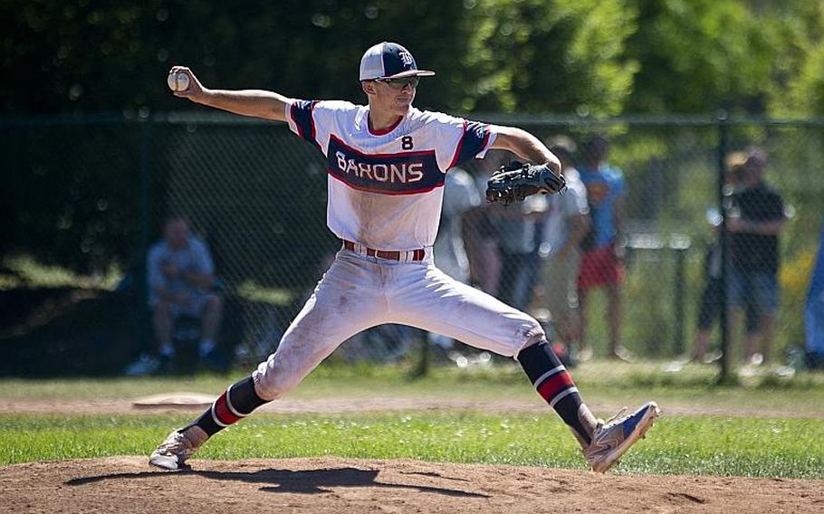 Bitburg's Max Little throws a pitch during the DODEA-Europe Division II/III baseball championship at Ramstein Air Base, Germany, on Saturday, May 27, 2017. Bitburg lost the game against Sigonella 10-1.

MICHAEL B. KELLER/STARS AND STRIPES