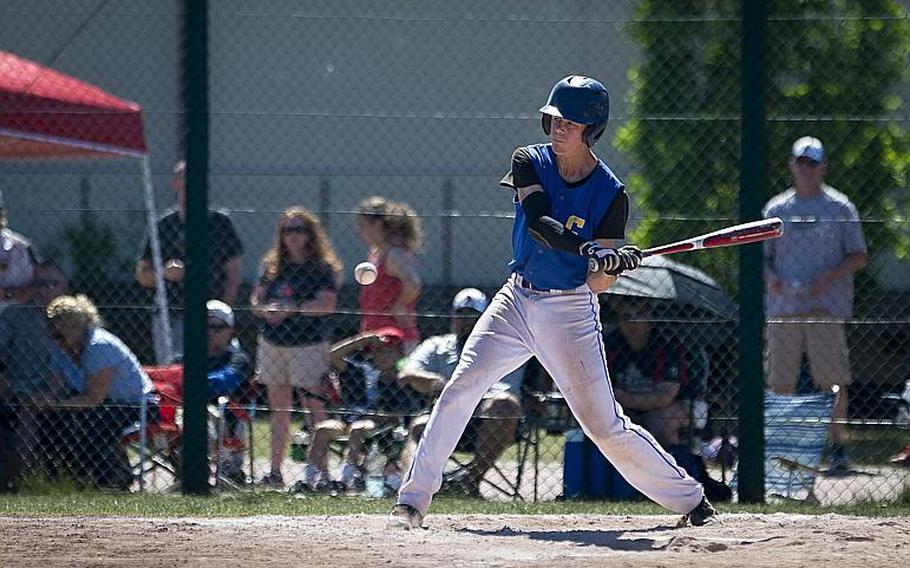 Sigonella's Andrew Taylor swings for the ball during the DODEA-Europe Division II/III baseball championship at Ramstein Air Base, Germany, on Saturday, May 27, 2017. Sigonella beat Bitburg 10-1 to win the title.

MICHAEL B. KELLER/STARS AND STRIPES