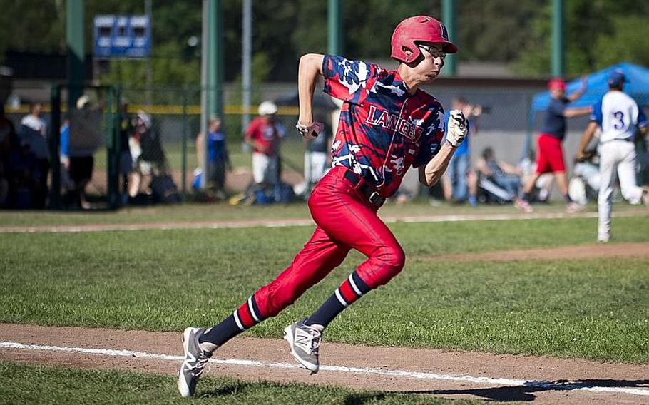 Lakenheath's Trevor Kelly runs to first during the DODEA-Europe Division I baseball championship at Ramstein Air Base, Germany, on Saturday, May 27, 2017. Lakenheath lost the game against Ramstein 8-6.

MICHAEL B. KELLER/STARS AND STRIPES