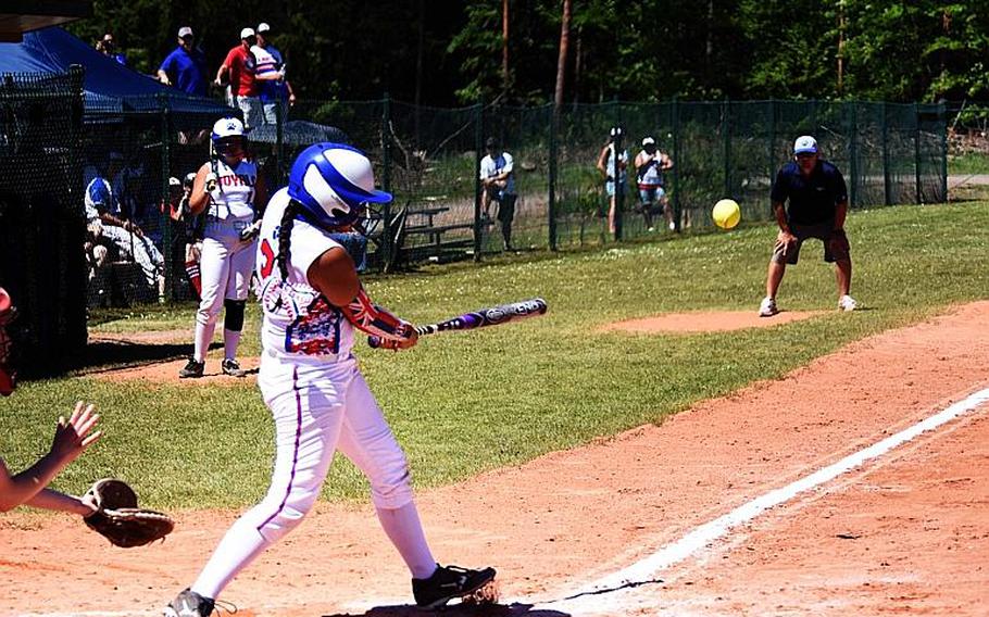 Ramstein's Azure Agricula-McCormick hits a ball during the semifinal game against Kaiserslautern at Ramstein Air Base, Germany, on Saturday, May 27.