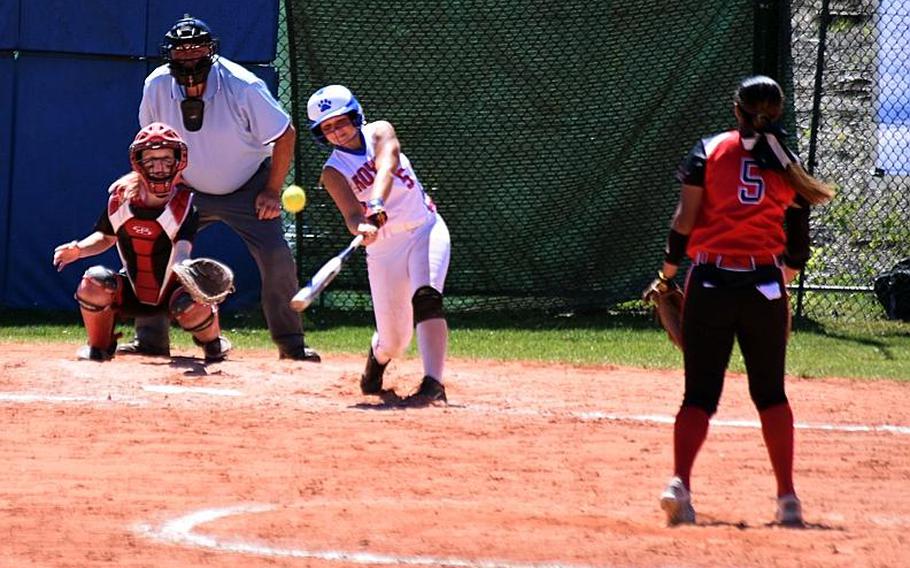 Ramstein's Brea Mangham hits a ball pitched by Kaiserslautern's Ally Alamos during the semifinal game at Ramstein Air Base, Germany on Saturday, May 27.