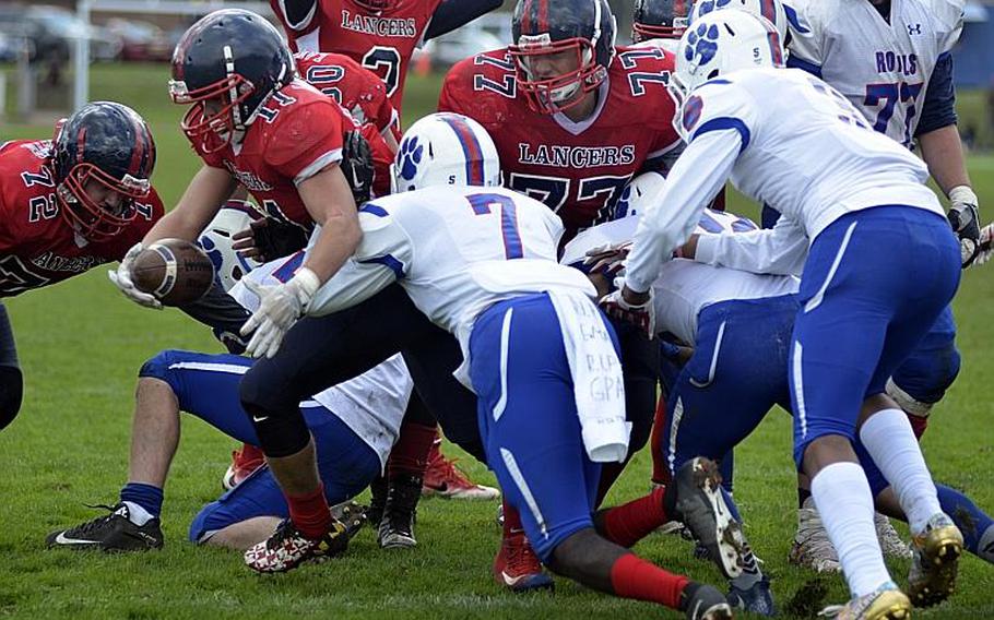 Lancer fullback Manny Cordero sheds the Ramstein defense for a goal-line touchdown at RAF Lakenheath, England, Saturday, September 30, 2017.