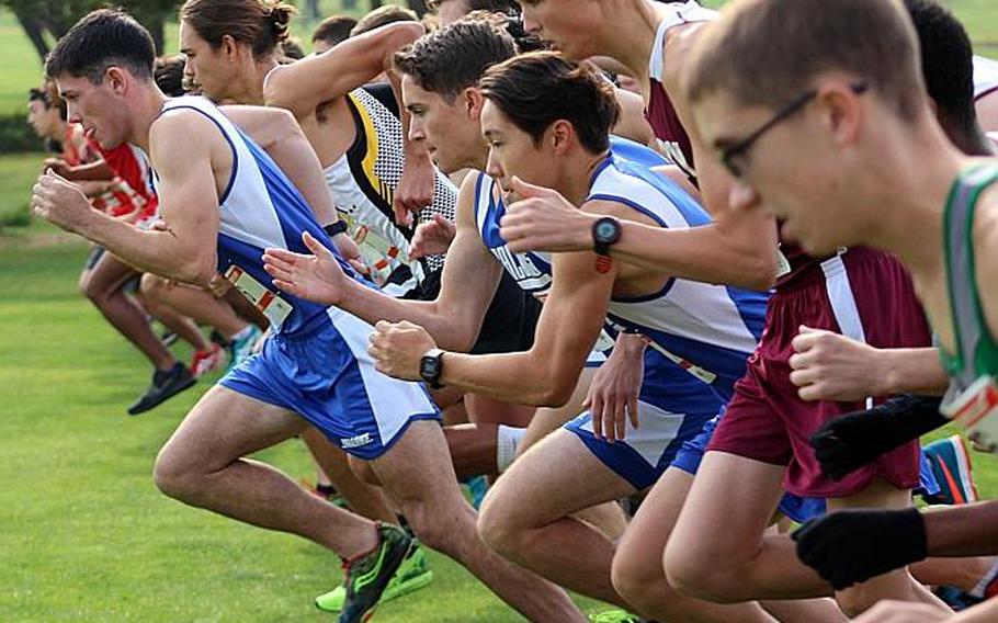 Seoul American senior and Far East cross country meet boys race winner Tucker Chase breaks off the start line with the pack to open Wednesday's race. He's the first Falcon to win the boys 3.12-mile individual race since Thomas Kim in 2009.