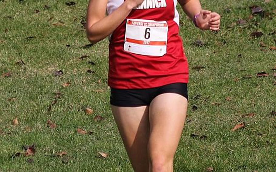 Senior Taryn Cates-Beier of Nile C. Kinnick crossed the finish line in 20 minutes, 1 second, capturing the Division I and overall Far East girls cross country individual race titles.