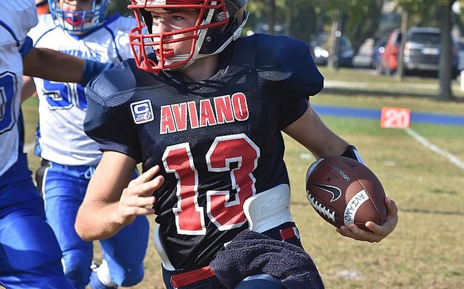 Aviano quarterback Mason Shine gained only 3 net yards on the ground on Saturday, Oct. 14, 2017,  but threw for more than 160 yards in the Saints' 33-30 victory over Rota.