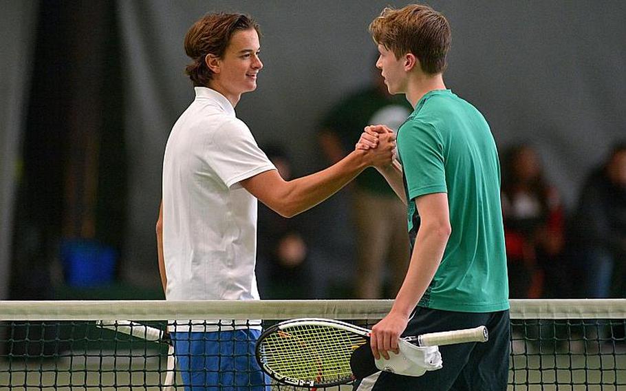 Marymount's Mathias Mingazzini, left, shakes hands with SHAPE's Noah Banken after defeating him 6-2, 6-1 to defend his boys singles title at the DODEA-Europe tennis championships in Wiesbaden, Germany, Saturday, Oct. 28, 2017.