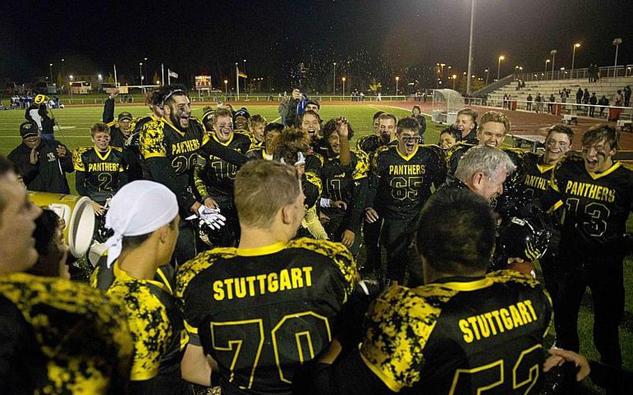The Stuttgart Panthers celebrate winning the DODEA-Europe Division I championship at Vogelweh, Germany, on Saturday, Nov. 4, 2017. Stuttgart defeated Ramstein 26-21 to win the title.