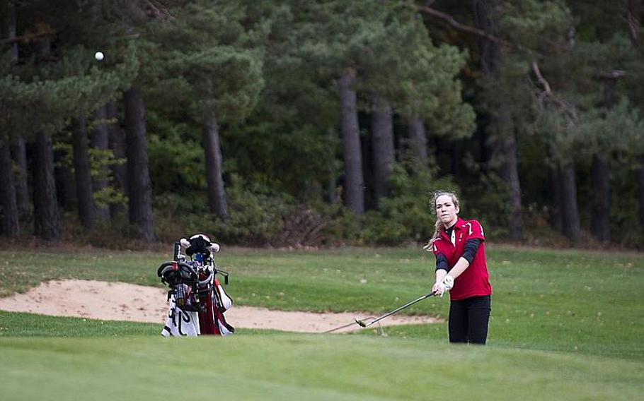 Kaiserslautern's Jasmin Acker chips a shot to the green during the DODEA-Europe golf championship at Rheinblick golf course in Wiesbaden, Germany, on Friday, Oct. 13, 2017.
