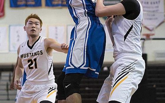 Quintin Metcalf, shown playing in a 2017 Far East Division I Tournament game against American School In Japan, transferred to Humphreys over the summer and now helps lead the unbeaten Blackhawks. They're favored to win the Far East Division II Tournament and could face off with the Mustangs for the combined tournament title later next week.

Jessica Bidwell/Stars and Stripes