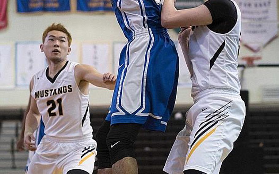 Quintin Metcalf, shown playing in a 2017 Far East Division I Tournament game against American School In Japan, transferred to Humphreys over the summer and now helps lead the unbeaten Blackhawks. They're favored to win the Far East Division II Tournament and could face off with the Mustangs for the combined tournament title later next week.