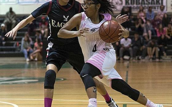MVP going against MVP in last year's Far East Girls Division I Tournament final at Kubasaki. Kadena's Rhamsey Wyche dribbles against American School of Bangkok's Shainque Lucas during the Eagles' 52-31 win over the Panthers.

Jessica Bidwell/Stars and Stripes