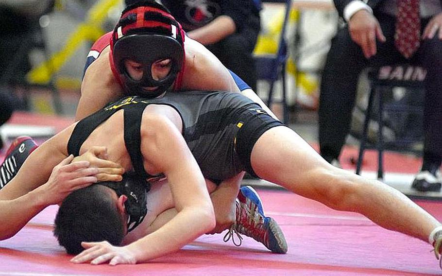Aviano's Jacob Gamboa continued an unbeaten season by defeating Vicenza's Anthony Verduga at 138 pounds at the southern sectional on Saturday, Feb. 10, 2017.

KENT HARRIS/STARS AND STRIPES