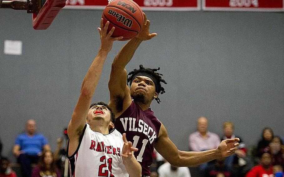 Vilseck's Terron Sizemore, right, blocks a shot by Kaiserslautern's Eril Santiago at Vogelweh, Germany, on Friday, Dec. 1, 2017. Vilseck lost 83-44.