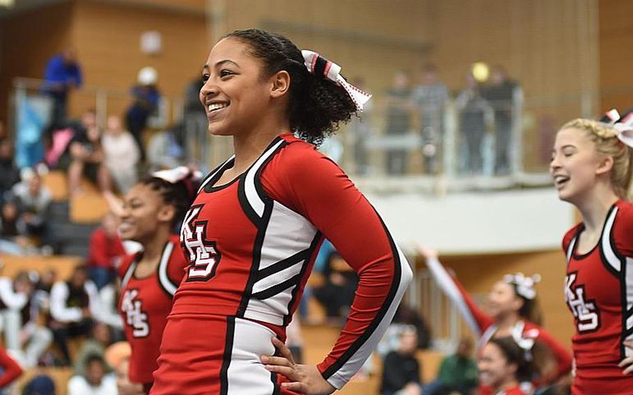 Kaiserslautern sophomore Elena Russey smiles while competing in the DODEA-Europe cheer tournament on Saturday, Feb. 24, 2018, in Wiesbaden, Germany.