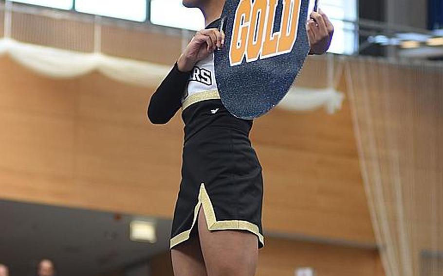 I'vani Tarver, a Vicenza junior, gets a boost during the DODEA-Europe cheer tournament on Saturday, Feb. 24, 2018, in Wiesbaden, Germany.