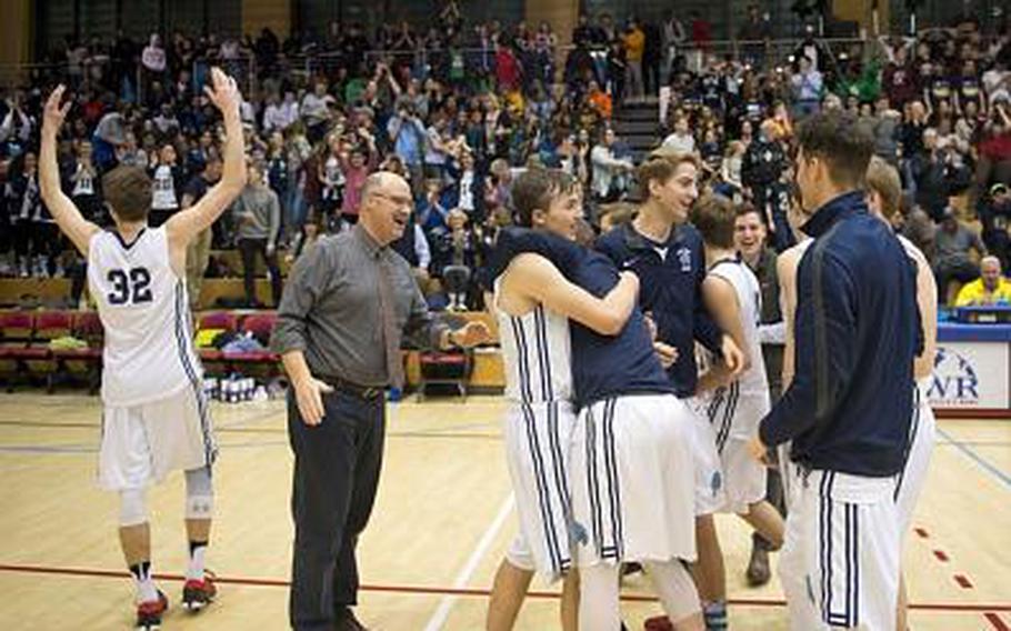 Black Forest Academy celebrates winning the DODEA-Europe Division II championship in Wiesbaden, Germany, on Saturday, Feb. 24, 2018. BFA defeated Rota 48-47 to win the title.