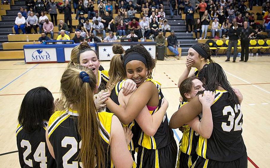 Stuttgart celebrates winning the DODEA-Europe Division I championship in Wiesbaden, Germany, on Saturday, Feb. 24, 2018. Stuttgart defeated Naples 31-25 to win the title.