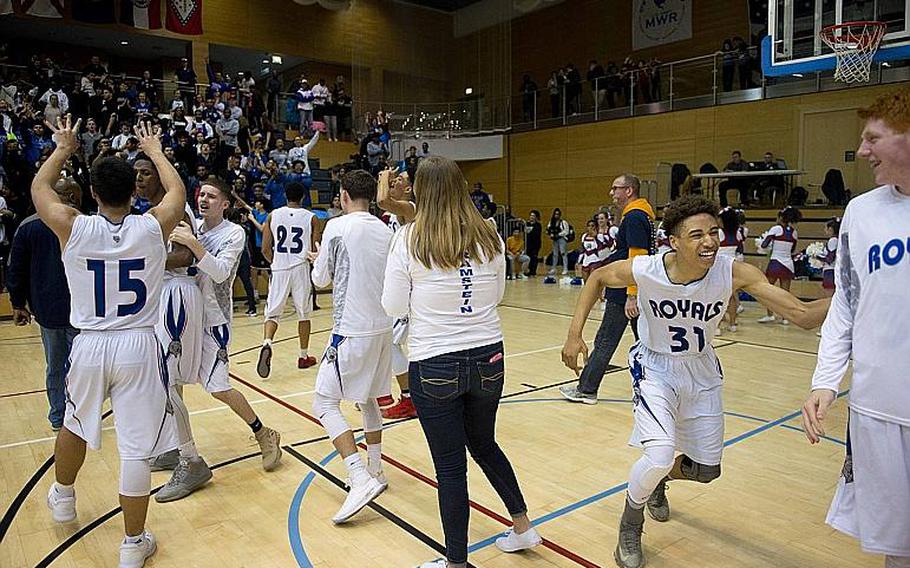 Ramstein celebrates winning the DODEA-Europe Division I championship in Wiesbaden, Germany, on Saturday, Feb. 24, 2018. Ramstein defeated Kaiserslautern 46-45 to win the title.
