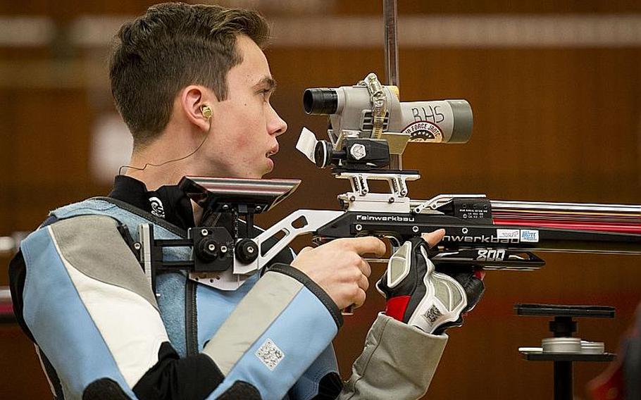Stuttgart's Callum Funk checks his shot placement during the DODEA-Europe Marksmanship championship at Vogelweh, Germany, on Saturday, Feb. 3, 2018. Funk took the top overall shooter spot with 574 points.