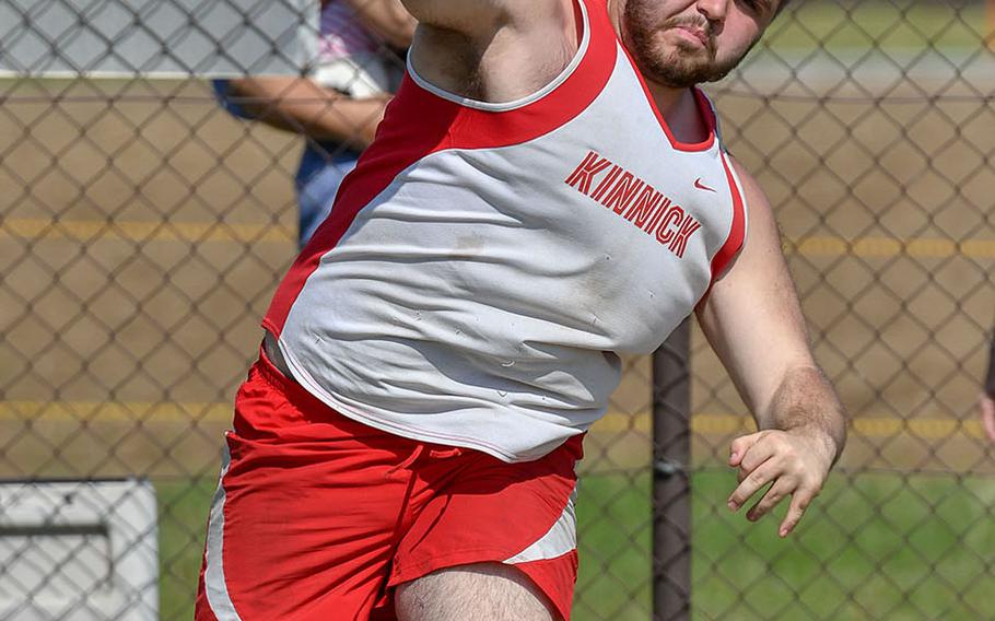 Nile C. Kinnick's Connor Joley lets loose with a shot-put toss of 12.46 meters, good for second behind teammate Kameron Leon Guerrero (12.70) during Saturday's DODEA Japan-Kanto Plain track and field meet.
