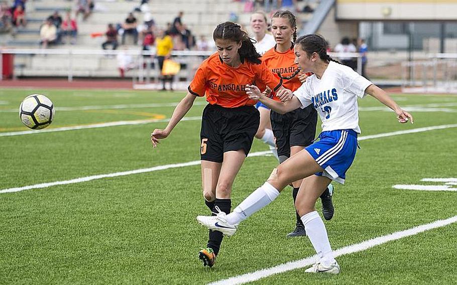 Rota's Avery Nancy, right, passes the ball in front of Spangdhalem's Andrea Mercado during the DODEA-Europe Division II soccer championship in Kaiserslautern, Germany, on Thursday, May 24, 2018. Rota lost the game 2-0.