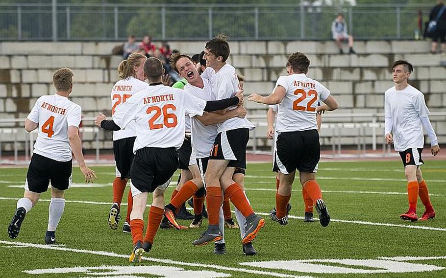 AFNORTH celebrates a 2-1 victory over Marymount to win the DODEA-Europe Division II soccer championship in Kaiserslautern, Germany, on Thursday, May 24, 2018.