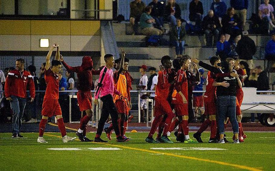 Kaiserslautern celebrates a 2-1 victory over Stuttgart to win the DODEA-Europe Division I soccer championship in Kaiserslautern, Germany, on Thursday, May 24, 2018.