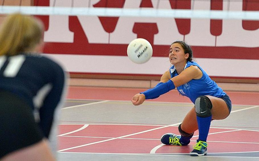 Marymount's Arianna Riviere digs deep to reach a Black Forest Academy serve in the Division II championship match at the DODEA-Europe volleyball finals. Marymount took the title with a 24-26, 25-18, 25-21, 25-13 win.