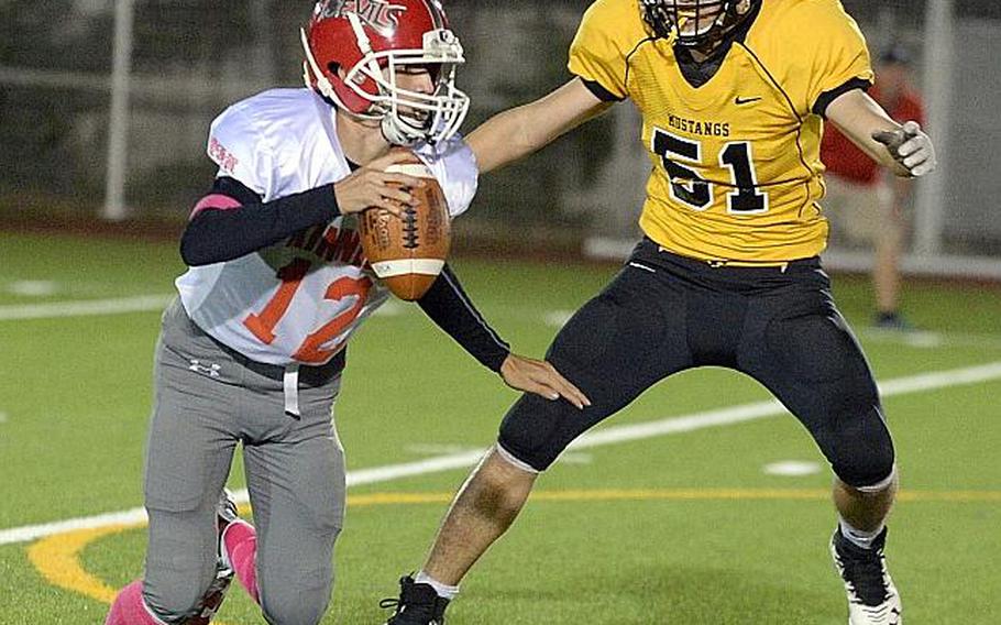 Nile C. Kinnick quarterback Patrick Kelly took the reins of the Red Devils offense this season after being the understudy for two years and led Kinnick to its first DODEA Pacific Far East Division I football title.