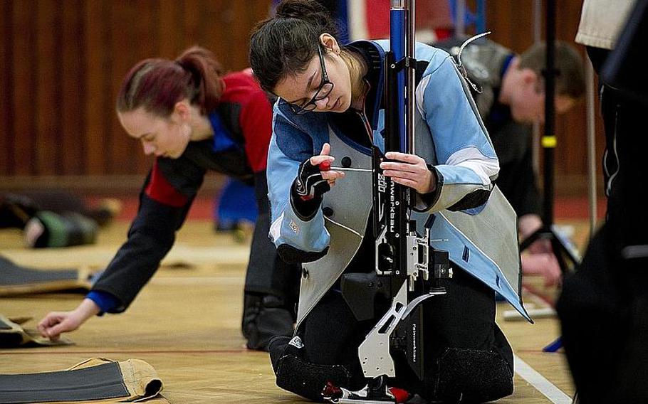 Stuttgart's Isabelle Ploechinger makes adjustments to her rifle during the DODEA-Europe Marksmanship championship at Vogelweh, Germany, on Saturday, Feb. 3, 2018. Ploechinger, who now attends Kaiserslautern, was second best overall shooter with 572 points. 