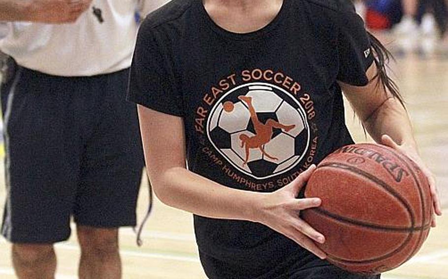 Emily Taynton is one of four juniors returning to a Yokota girls basketball team that has won the last four straight DODEA-Japan and Far East Division II tournaments.