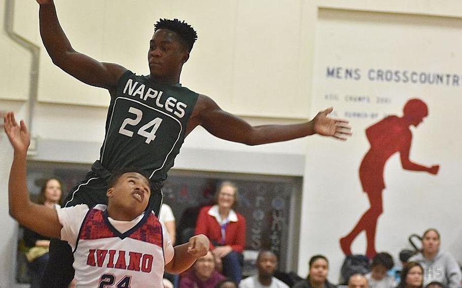 There was no question of which No. 24 could jump higher Friday night. But Aviano's DJ Vaughns managed to get off his shot and score in the Saints' 51-44 victory over Naples' Ashton Jeanty and the Wildcats.
