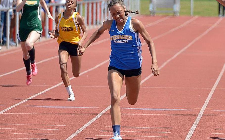 Wiesbaden's Whitney Bivins sprints to the finish line in the girls 200-meter race at the2018 DODEA-Europe track and field championships.