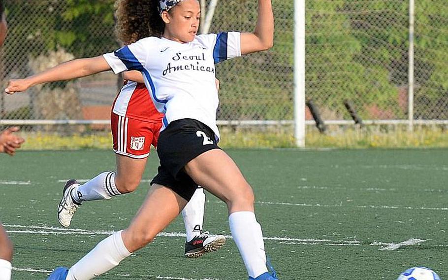 Seoul American's Mya Rolison gets set to boot the ball against Seoul Foreign during Wednesday's Korea girls soccer match. The Crusaders won 4-1 and clinched the Korea Blue regular-season championship.