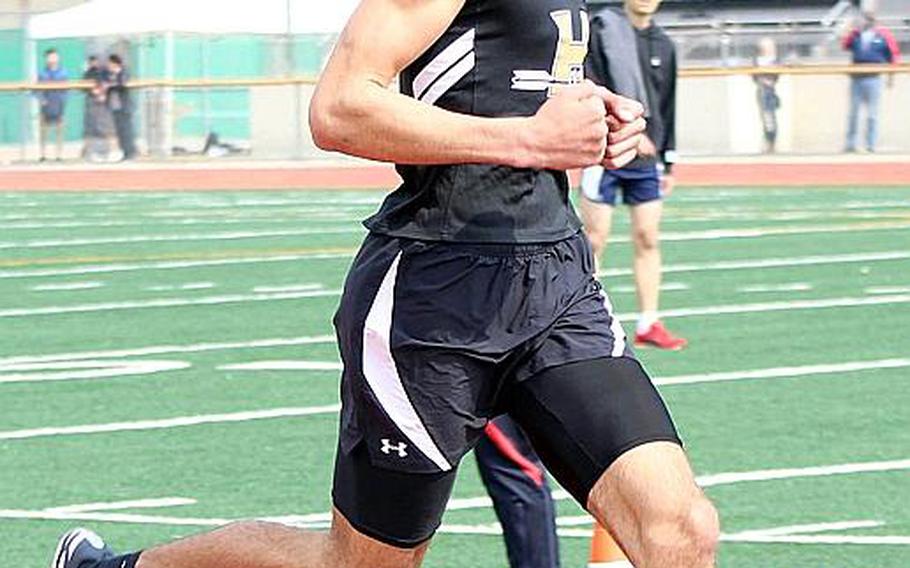 Humphreys' Quintin Metcalf, shown running the 800, is expected to challenge the Pacific and Far East meet records in the high jump, both at this week's Korea district finals and Far East at Yokota later this month.