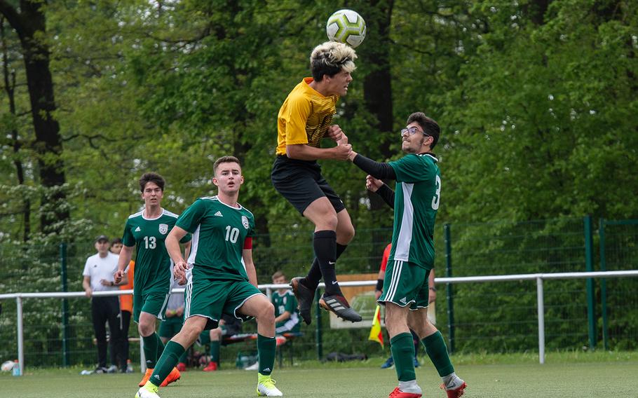 Stuttgart's DJ Gagalla heads the ball during game against SHAPE on the first day of the DODEA-Europe soccer championships, Monday, May 20, 2019.