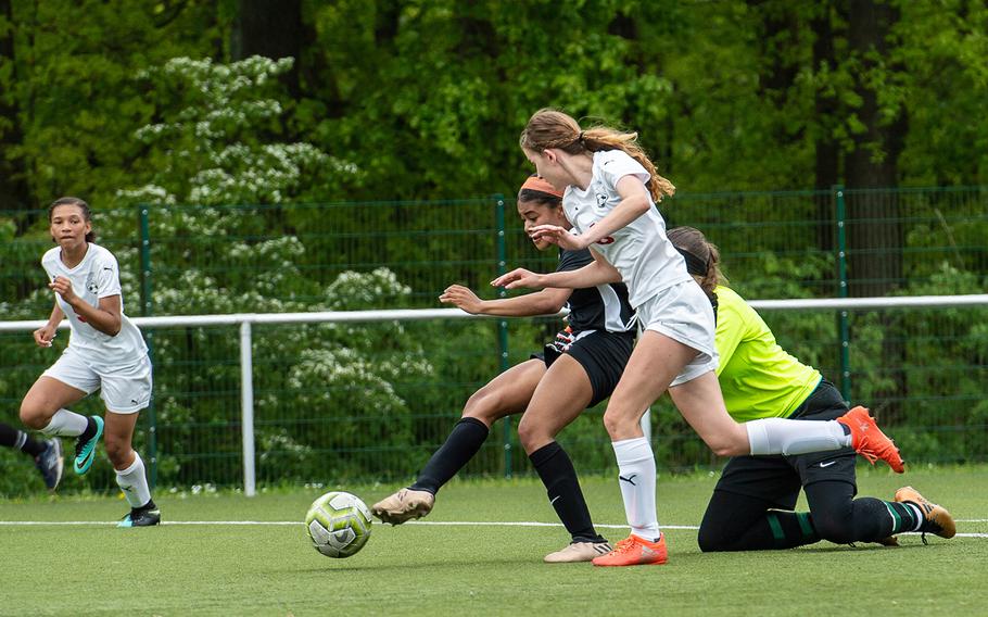 Stuttgart's Bettina Wagner shoots and scores during a game against Kaiserslautern on the first day of the DODEA-Europe soccer championships, Monday, May 20, 2019.