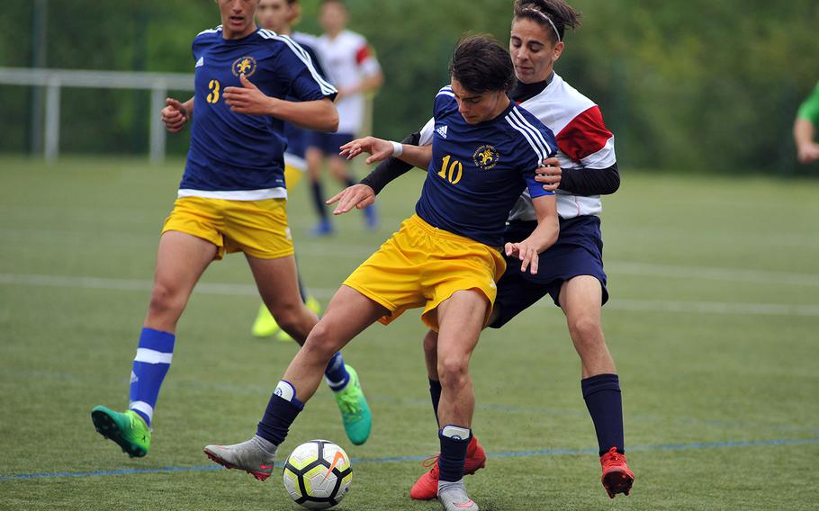 Florence's Carlo Marchi and Aviano's Cole Hinchcliff fight for the ball in a Division II semifinal in Reichenbach, Wednesday, May 22, 2019. Aviano won the game 1-0 and will face AOSR in Thursday's final.